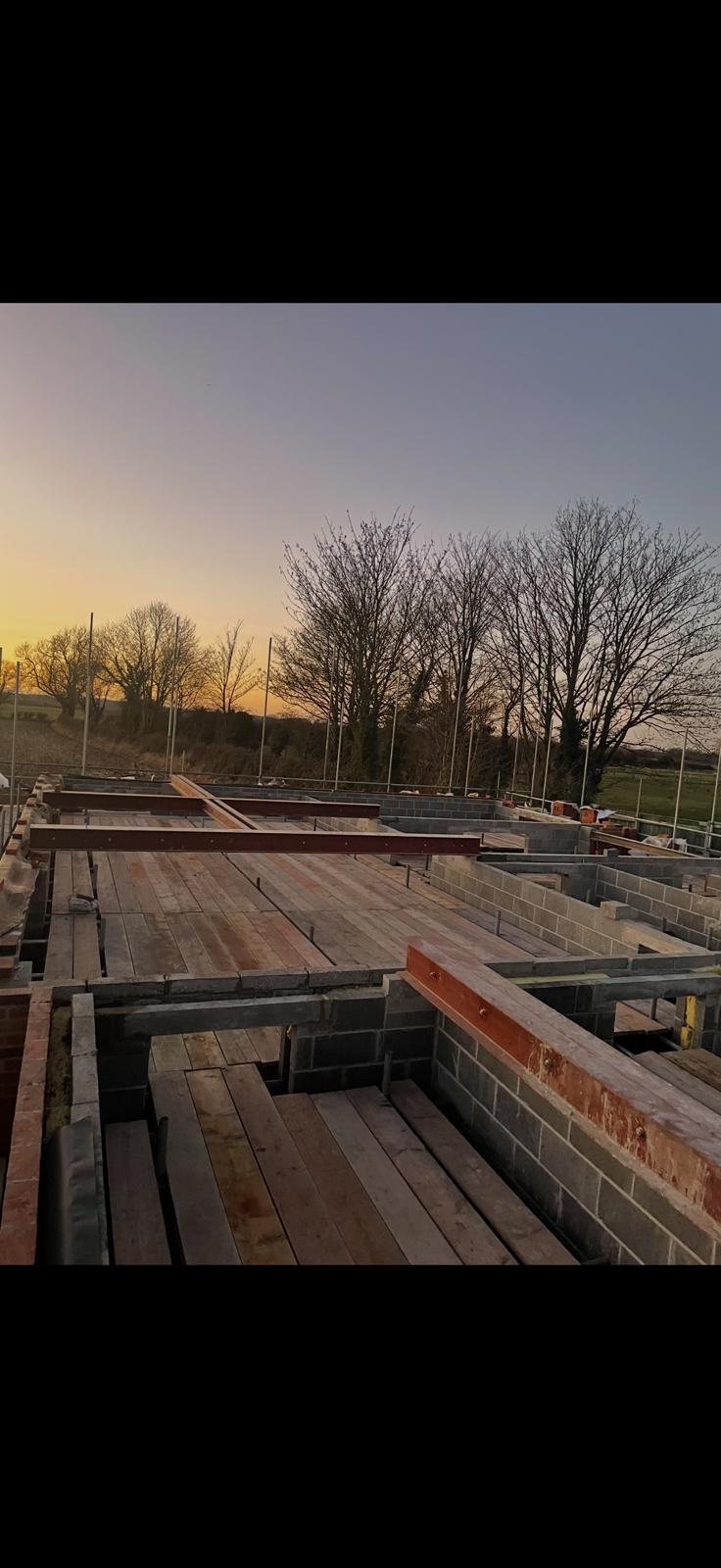 View from the top lift of a scaffold at sunset over open Yorkshire countryside